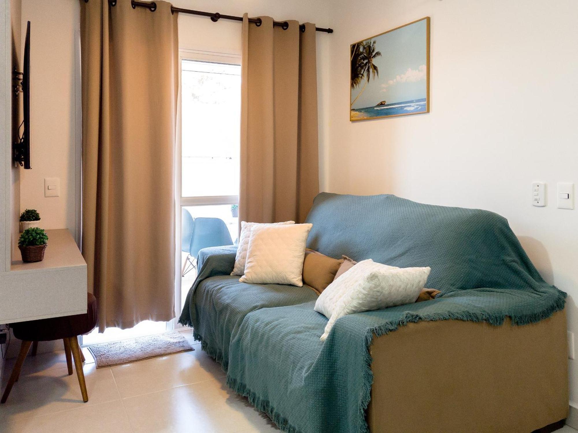 Vista Apartments: Beachside Retreat With Rooftop Pool